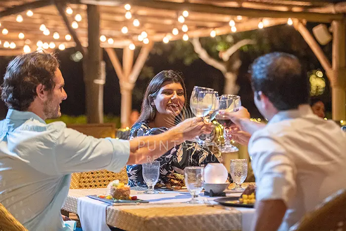 Picture of a 3 people enjoying a dining experience at La Yola Restaurant.