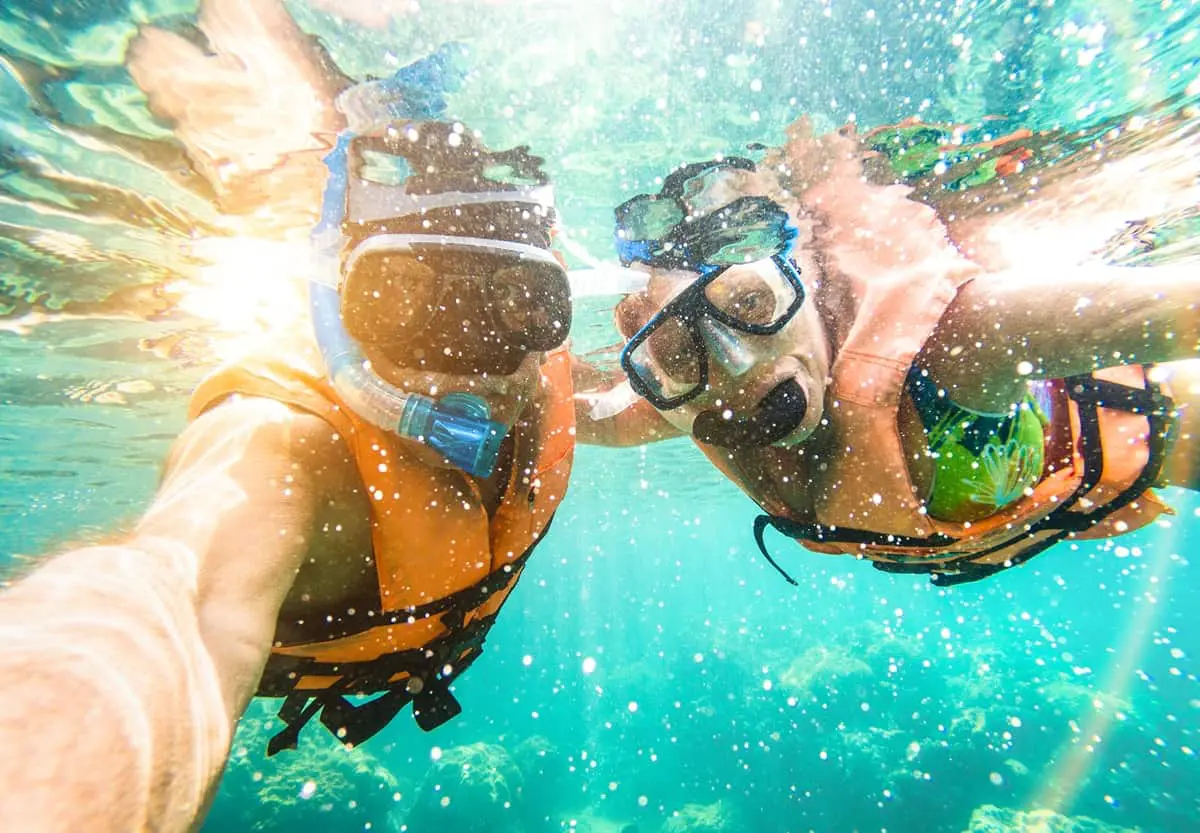 Selfie of a couple snorkeling in the tropical waters in Punta Cana.